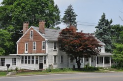 Pictured - Cobb's Tavern: A structure in Sharon MA originally built in the 1940s that has been converted into a private residence. Photo credit: Wikimedia Commons.