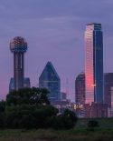 Dallas Skyline at sunset with multicolored LED lights