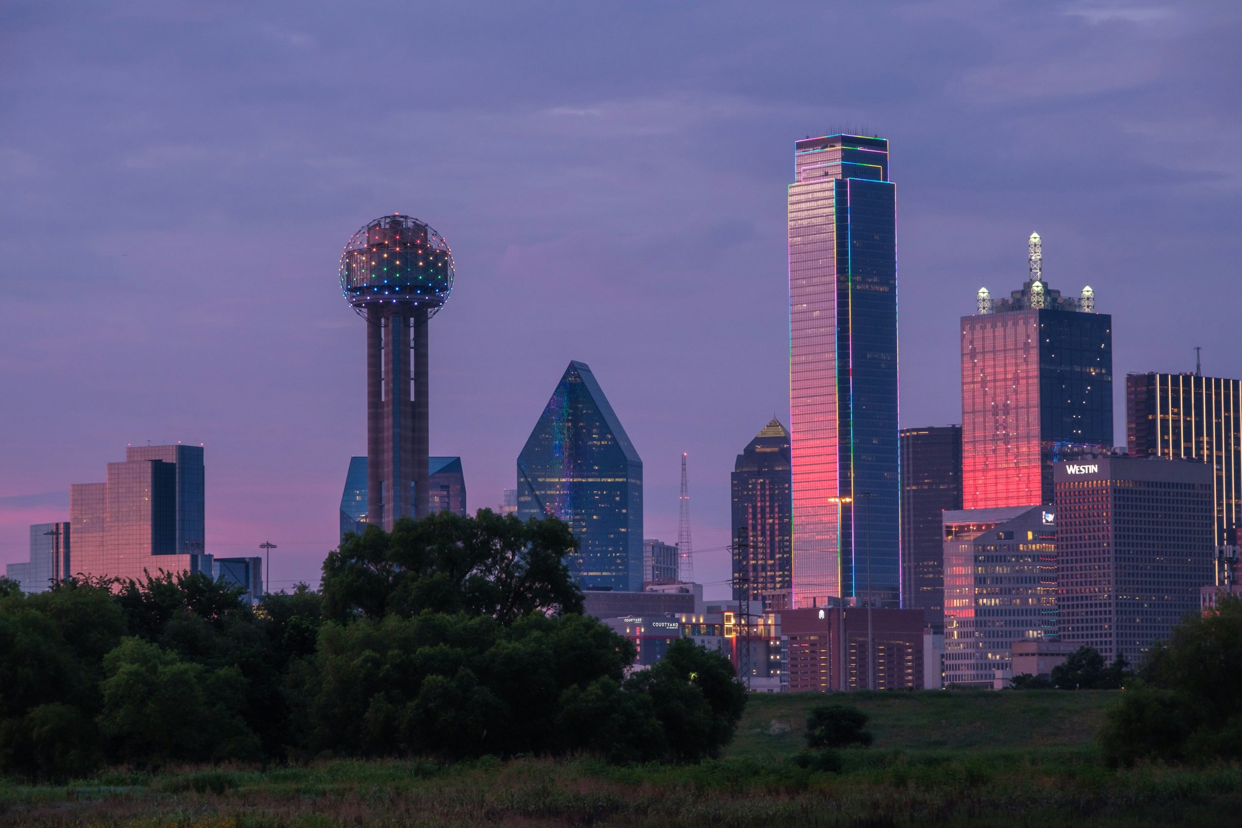 Dallas Skyline at sunset with multicolored LED lights